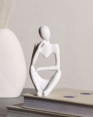 White Ceramic Figurine: Left-Handed